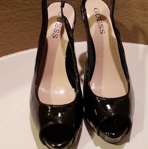 Black peep toe sling back pump